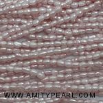 3608 freshwater rice pearl strand about 2mm light pink.jpg